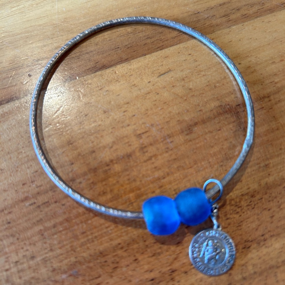Brand new bracelet with sea glass and st Christopher charm.